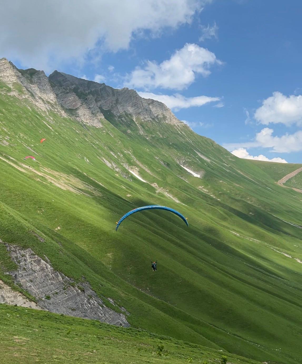 Standard Fly — paragliding past the Russia-Georgia Friendship Monument, Gudauri